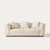 foto sofa minimalis modern kain boucle krem dengan tufting terlihat dari depan
